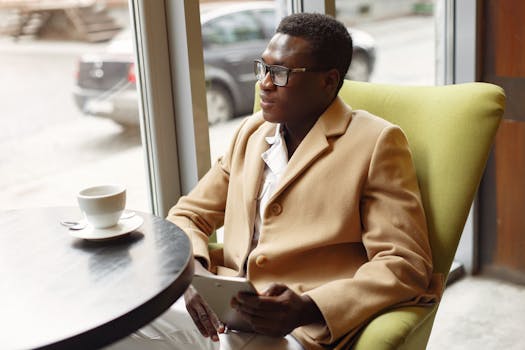 person reading with a cup of coffee
