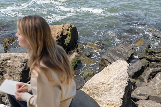 person journaling in nature