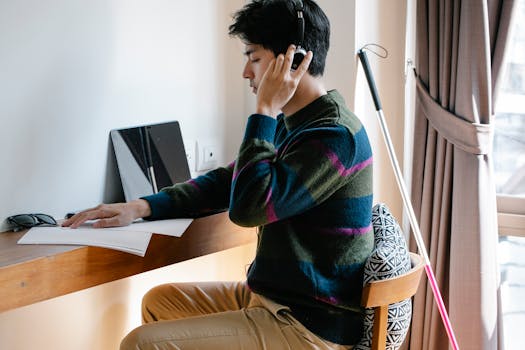 a person studying on a tablet